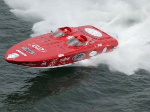 Power boats could mean a "powerful" ministry that rides on the waves of the Holy Spirit (water). It could also mean fast-moving progress.