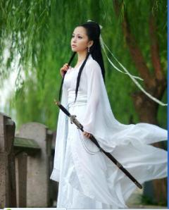 A woman in white with a sword could signify purity in battle.